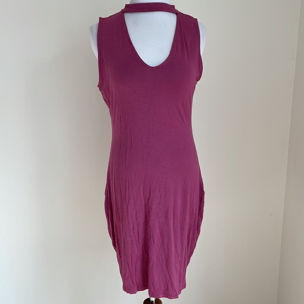 Dress sleeveless peekaboo openings above the knee size Medium by Charlotte Russe